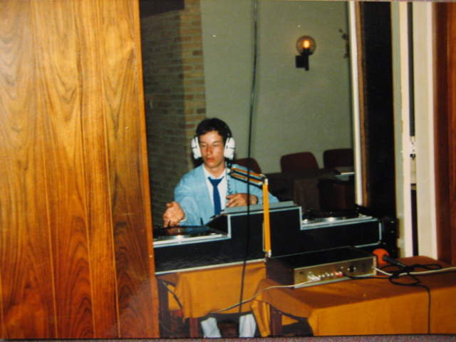 playing music at a family party; selfmade console with two turntables, a eq, and a mixer. notice the DBX expander in front of the table...RARE still.