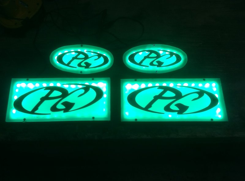 Just got my green LED strip installed in the PG surfer logo boxes... next installation of the boxes in the floor and door panels...pics to come...