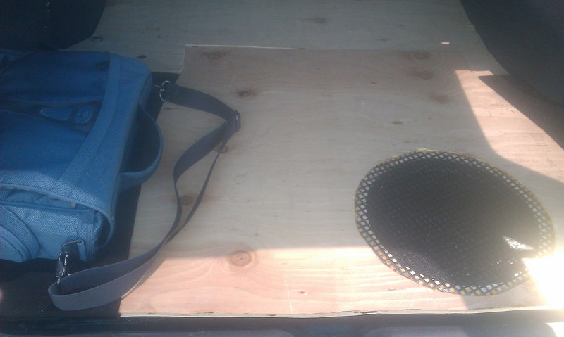 I dremeled out a layer of the plywood so my grill would be flush with the wood and glued/ stapled it down. I then adhered a piece of window screen to the under side to hide the woofer a 'lil more.