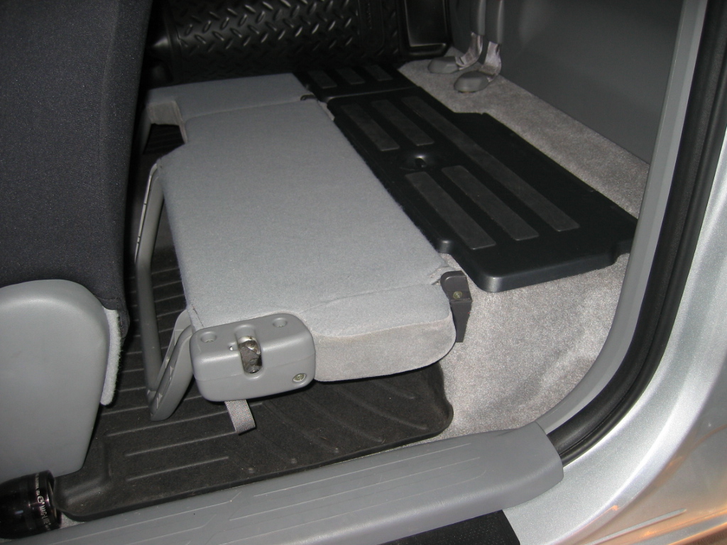 With both seats down, the access area now has a storage shelf.