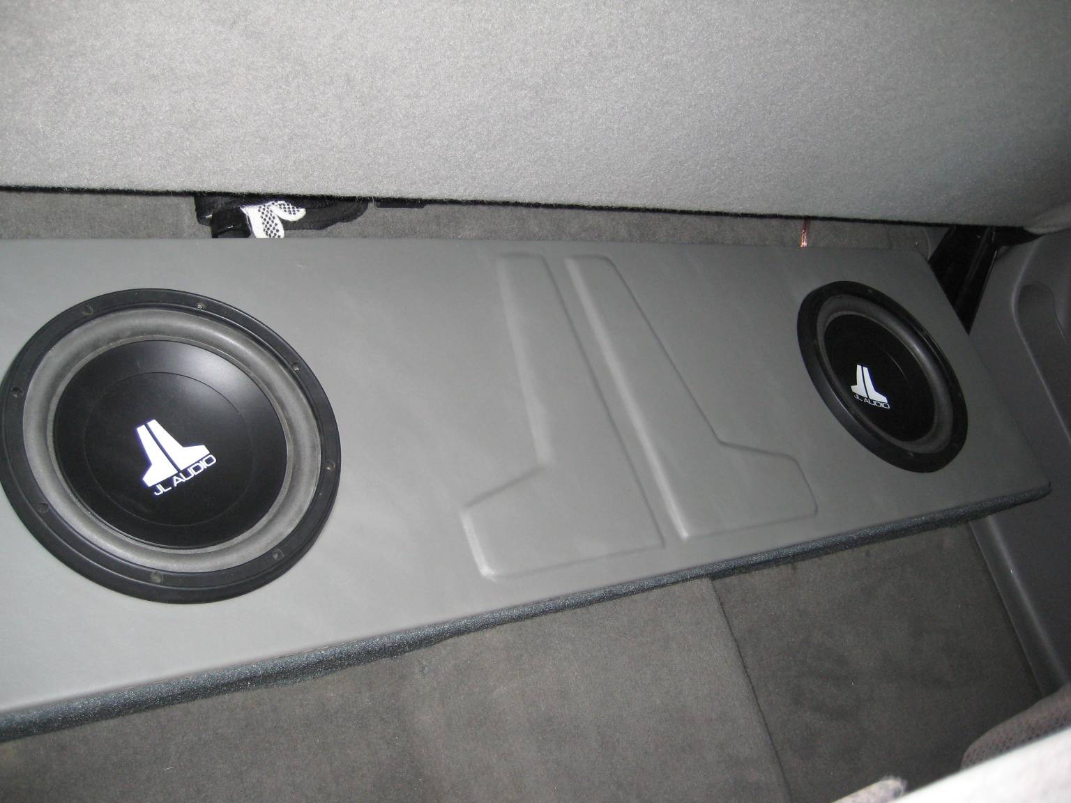 I'll be using the old enclosure, It's around .75 per side.
