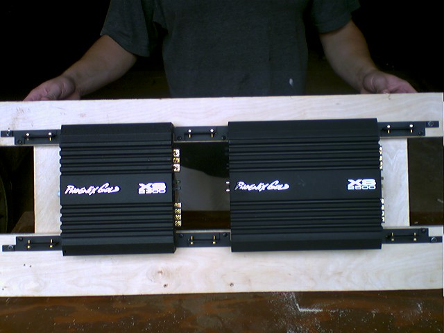 the amp rack.  im using 3 xs links to hide all the wires and make it look like a 3 foot moster amp in the back