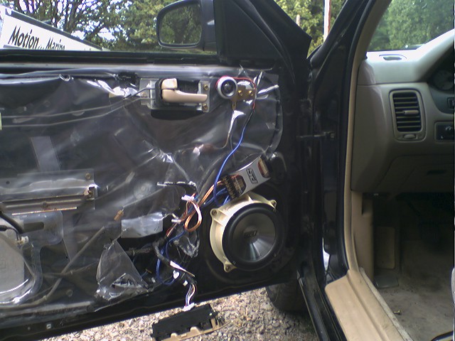 His doors, speakers all in the factory location.