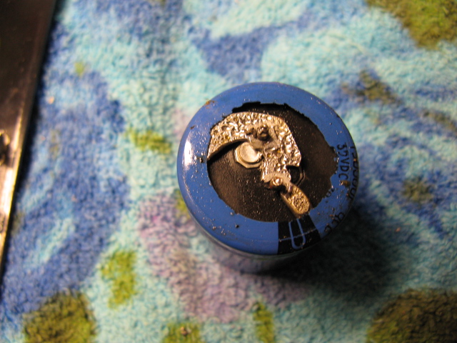 I found this cap just like this I couldn,t believe there was that much solder under it