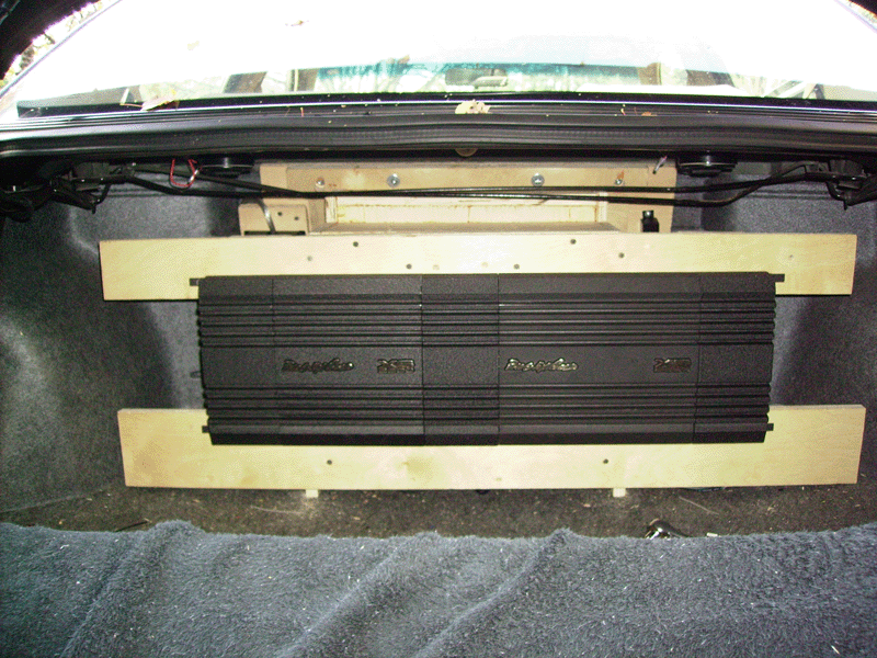 32&amp;quot; of XS fury!  i will be building trim pices to cover the amp rack and hide the wire/back of trunk