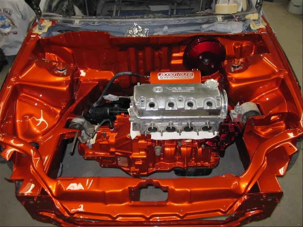 The color of the car...the engine bay was totally shave, all wiring were re-route inside the fenders and the brake lines and brake accessories were also re-route inside the car to give the engine bay a clean look. Finally the engine block was polish and t