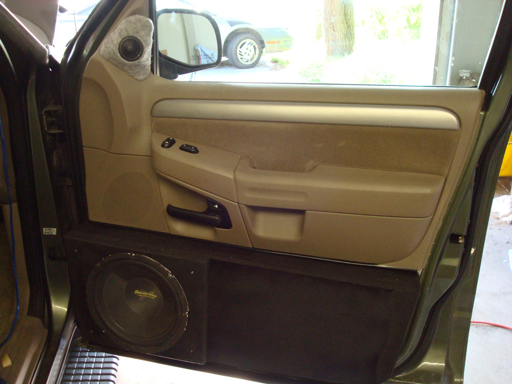 The tweeter pod sticks out a little far. Oh well. Both doors close fine after a little adjustment of the seat controls.