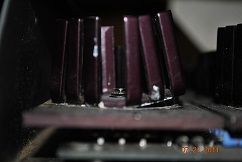 Being pushed from screws underneath, is this normal?