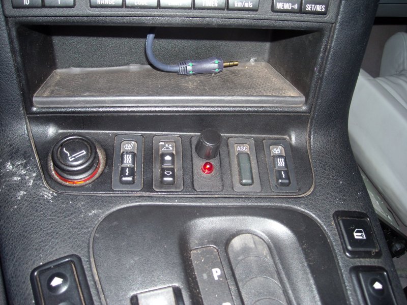 a close up of the LPL and the Aux in for her mp3 player.  it drops down through a factory hole.  she needs to clean her car!  (verts get dirty....some parts were kinda gross)