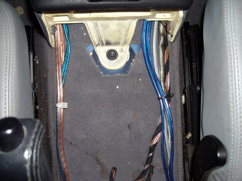 A shot of the wiring being run though the center console.  WAY easier in this car then running down the sides of the car
