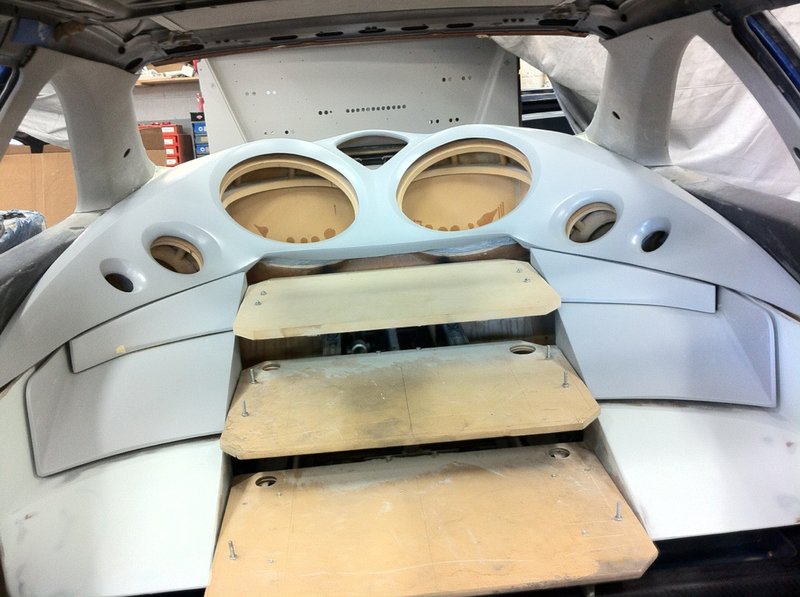 The rear...home to 3 Reactor amplifiers...and more...;). Tou can also see the tray in the trunk where it will numerous PG gear, ie. Ti DD10, Ti Basscube, etc...