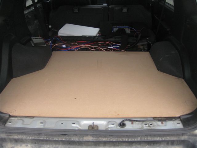 Cut 1/4&amp;quot; MDF Board out to size.  placed in cargo area...