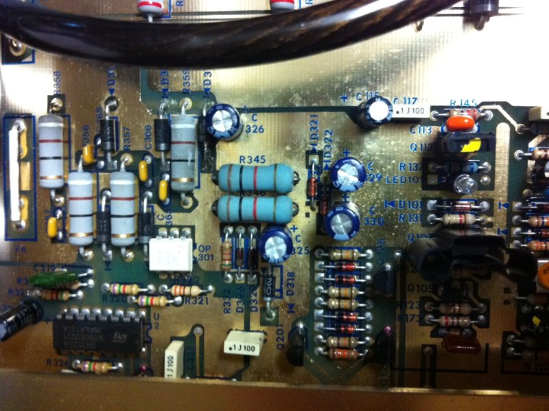 ok, its the two greenish ones in the center of the pic. If you have this amp and its positioned so that the conections are facing you the resistors will be on the right side of the amp almost in the middle. thanks guys.