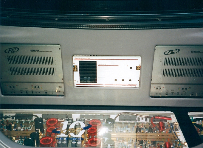 Looking at the back wall at the two EQ232ti's and the Audio Control center channel processor