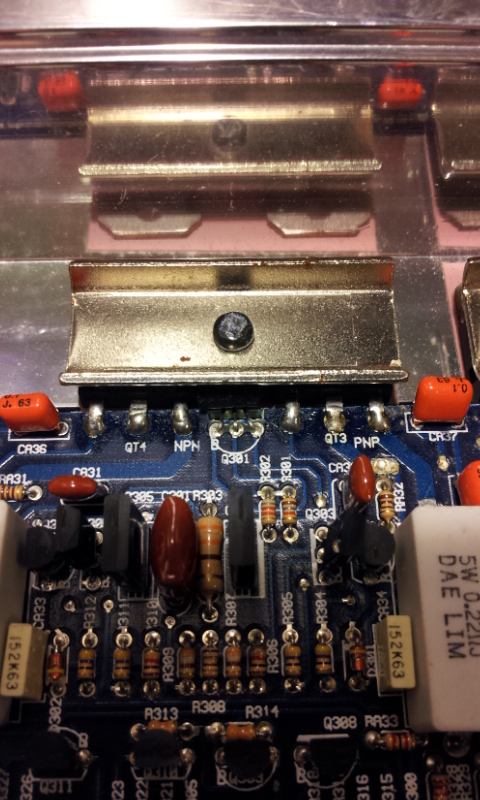 Only thing my untrained eye can see that looks funny is the solder joints on these transistors