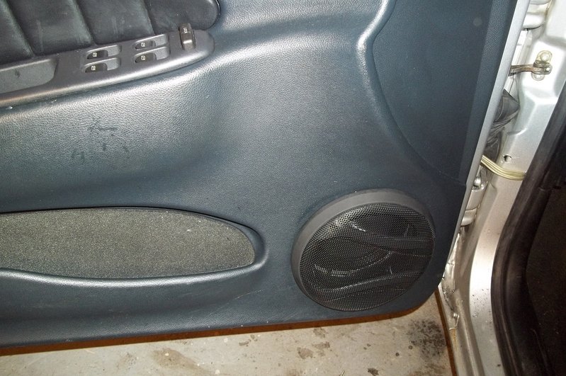 Here you can see the speaker is mounted to far in the door leaving a big gap