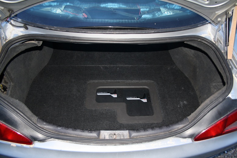 No wires seen in the trunk, false floor is 2mm over wires, sitting very solid.