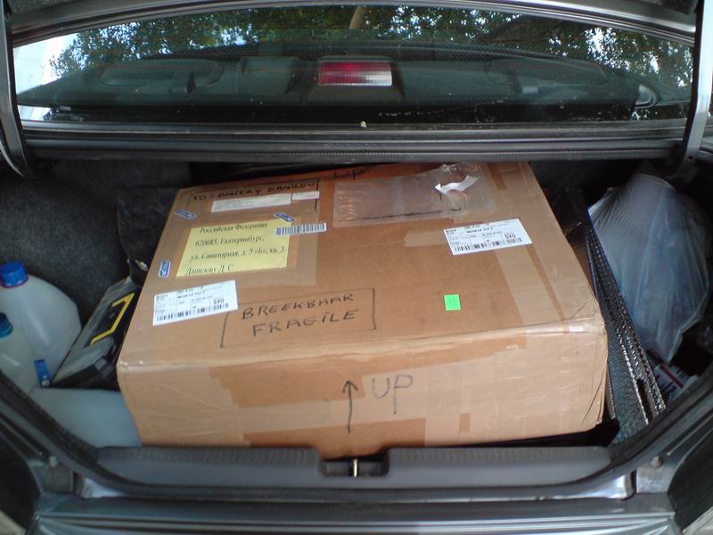 The package is in the trunk of my Mitsubishi Lancer; there is not so much free space left in the trunk after placing there a package