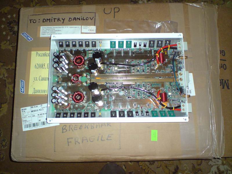 The amp and its package. Notice the dimensions difference!