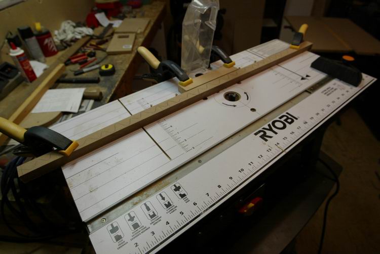 This is how I set up my router table for the dadoes. Prepare all pieces first, then you can cut all dadoes in a single jig.