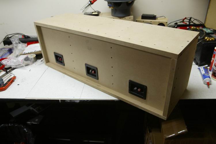 With each chamber wired to it's own port, I can re-configure wiring from the outside. See how the &amp;quot;lip&amp;quot; protects the terminals allows this unit to have the woofs face up without the ports being crushed.