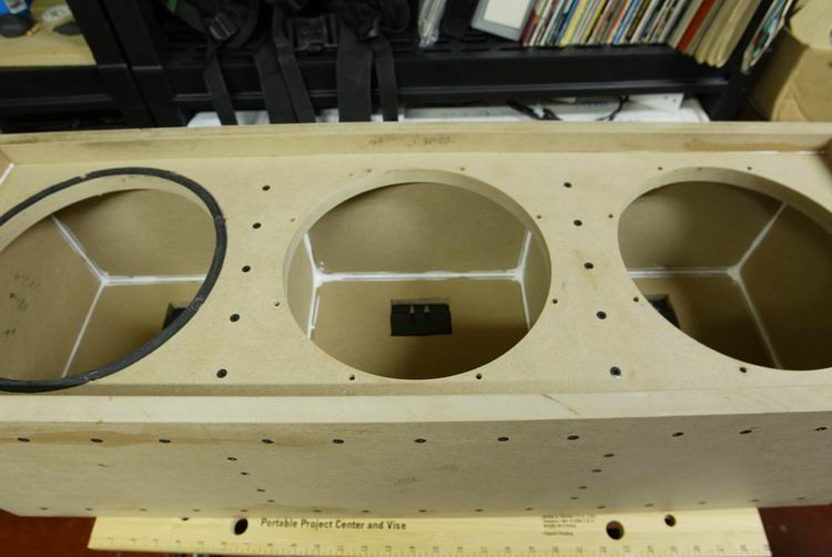 After all the screws were sunk, I ran a bead of glue along all seams inside each chamber. Again, the glue container's smaller size allowed me to fill &amp;quot;blind&amp;quot; through the woof hole. No leaks guaranteed.