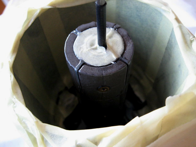 be sure to tape off the upper section, to prevent coating beeing sprayed on the center rod, and the top bearing in the magnet