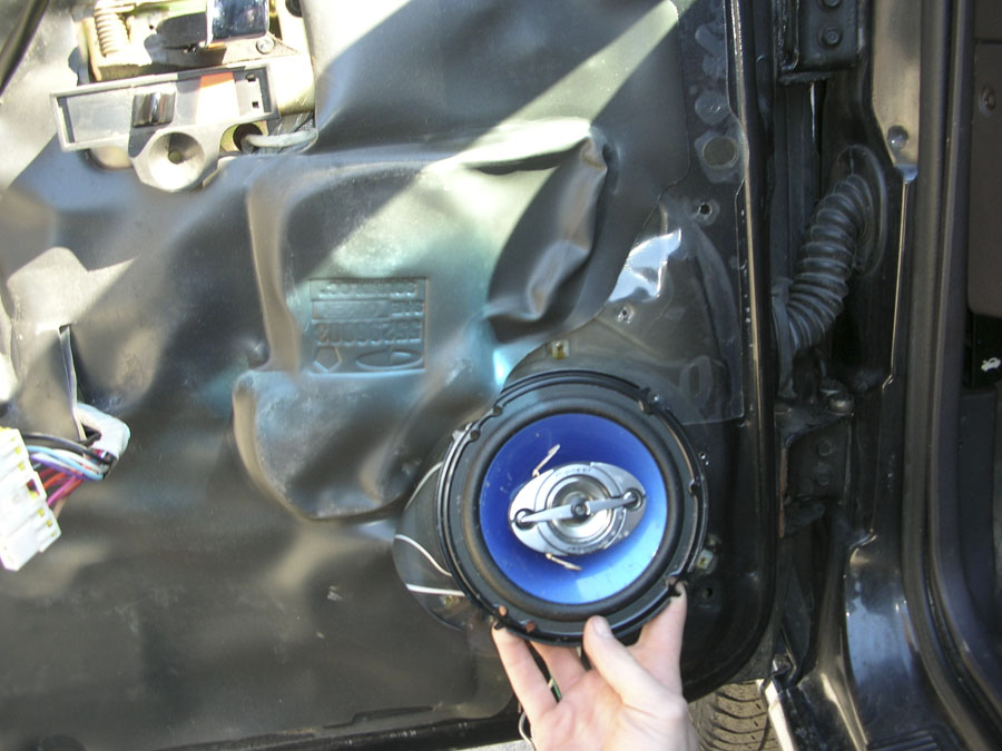 existing door speakers.  pioneer coax's.  the previous owner only  used tape on his connections,  which had fallen off leaving the leads exposed and corroded.  again, nice huh??