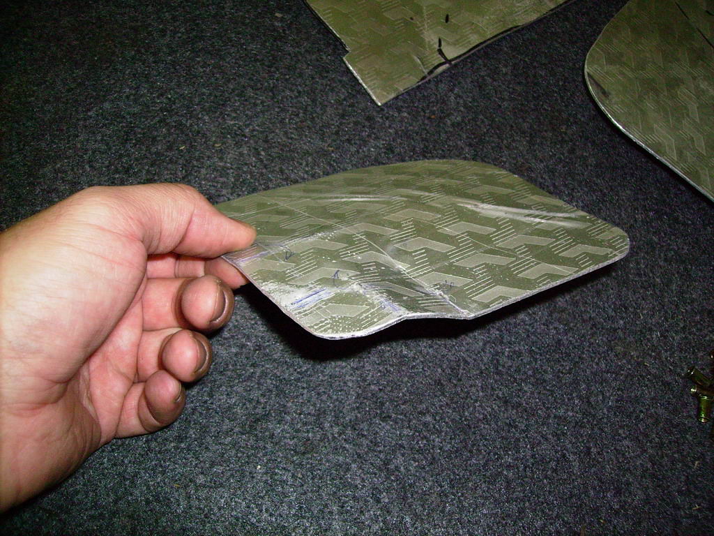 10 The plates are shaped to fit the edges of the holes.jpg