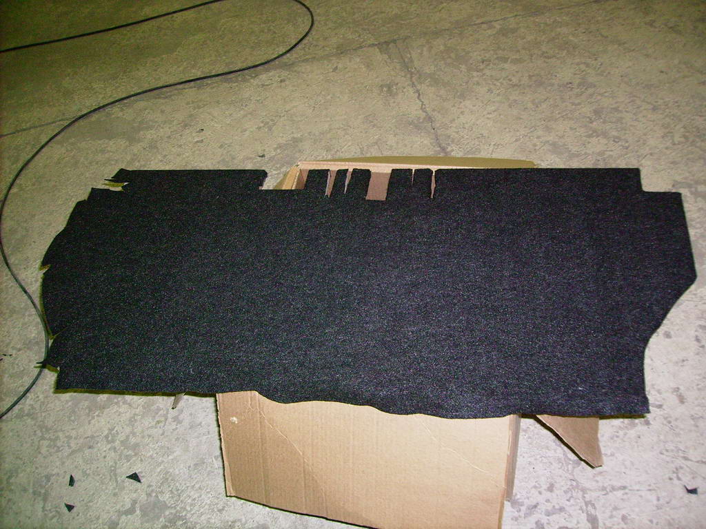 27 Dressing the panel in carpet.jpg